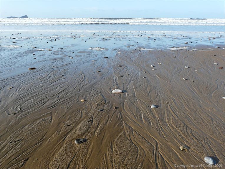 Sand patterns on the tide line