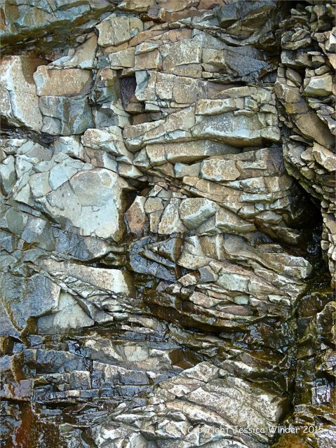 Close-up of the natural rock patterns in the cliffs at Cape Enrage
