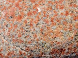 Close-up of the crystals in a granite pebble