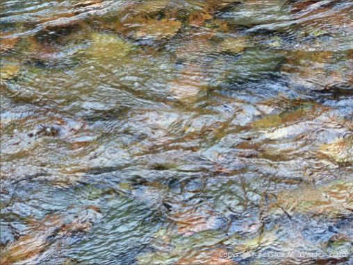 Water texture, colour and pattern in a fast flowing mountain stream