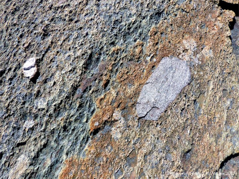 Angular rock fragments embedded in a volcanic ash matrix from a pyroclastic flow in Cape Breton Island