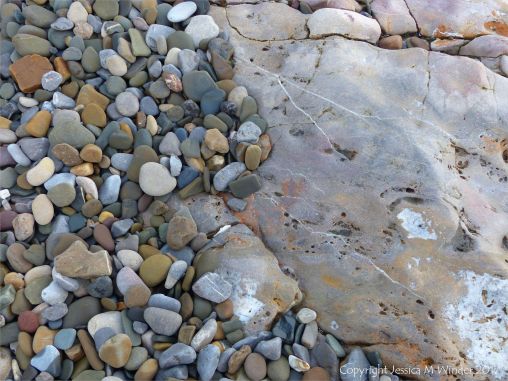 Rocks and pebbles near Twlc Point at Broughton Bay on the Gower Peninsula in South Wales