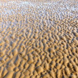 Natural patterns in the sand on the beach