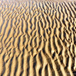 Natural patterns in the sand on the beach