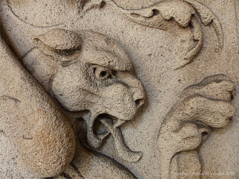 Stone carving of a mythical beast
