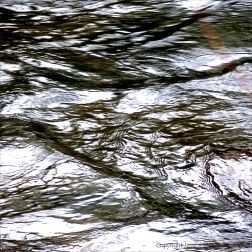 Fast water flowing in the Afon Llwyd